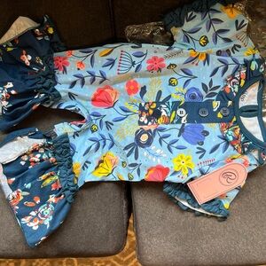 Indigo Baby Romper with Blue and Yellow Floral Design